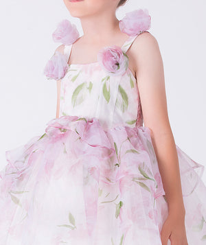 Close-up of the floral chiffon fabric and 3D rosette strap details on Mama Luma’s girls dress, crafted for special occasions and ages 3–12.