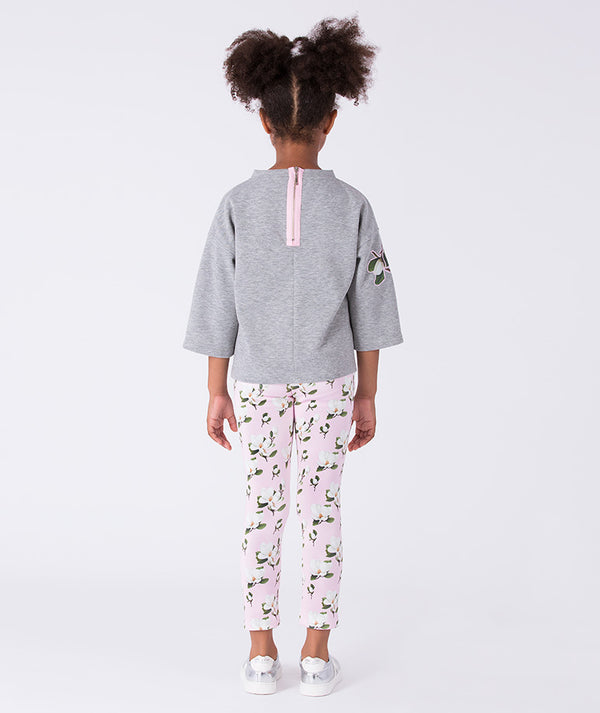 Back view of floral print girls leggings by Mama Luma, comfortable stretch leggings with all-over floral design