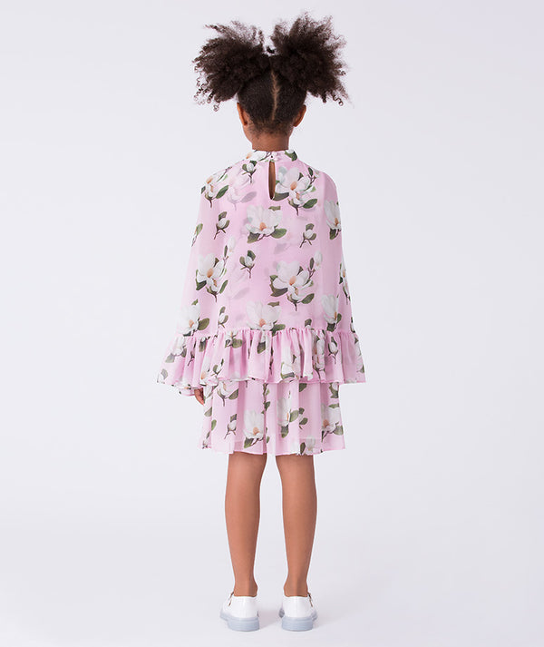 ack view of Mama Luma girls floral dress showing the relaxed silhouette and tiered skirt for family gatherings and celebrations, sizes 3–12