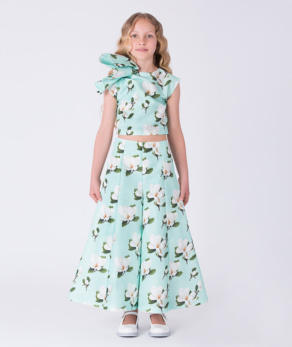 Girls two-piece floral outfit with ruffle detail top and wide-leg pants by Mama Luma