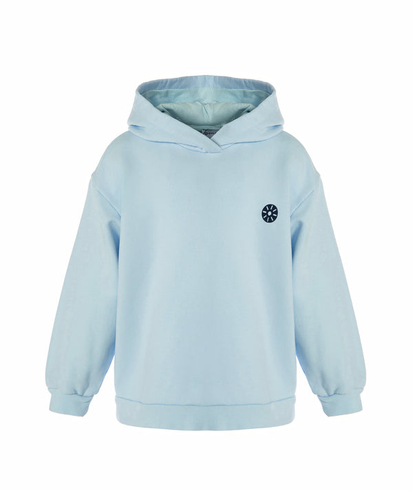 Front view of a light blue girls hoodie with a relaxed fit, attached hood, and minimalist chest emblem, designed for everyday wear, school outfits, and casual layering, available in sizes 3–14