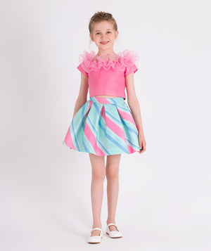 bubblegum pink blouse with ruffled neckline, pink and blue striped skirt