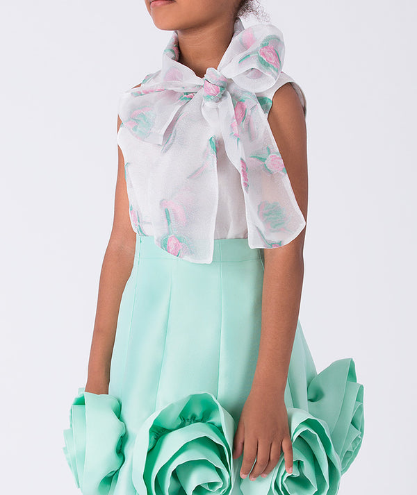 Mint green dress with floral top on a white background