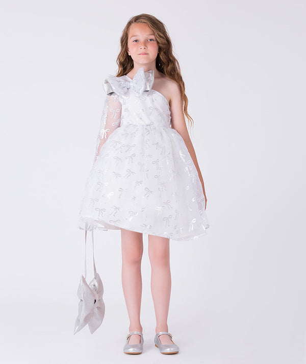 8 YEARS OLD girl wearing a white floral dress on a white background