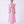 Carica l'immagine nel visualizzatore Galleria, Pink dress with ruffled sleeves on a white background
