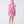 Load image into Gallery viewer, 6 years old girl wearing a pink dress with ruffled sleeves on a white background
