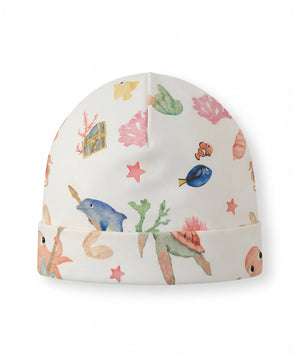Children's beanie with ocean-themed pattern on a white background