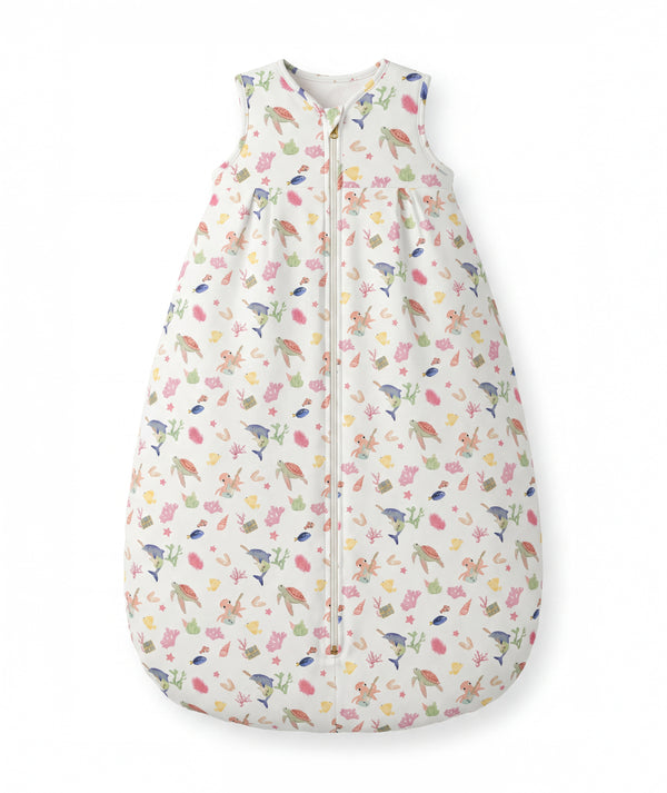 Children's sleeping bag with colorful animal pattern on a white background