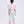 Carica l'immagine nel visualizzatore Galleria, Child wearing a pink top with puff sleeves and floral-patterned pants on a white background
