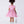 Load image into Gallery viewer, 6 YEARS OLD girl wearing a pink dress with white patterns on a white background
