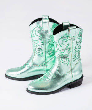 Front view of shimmering girls cowboy boots in mint green, handcrafted in Europe. Comfortable kids footwear for birthdays, Eid, and holidays.
