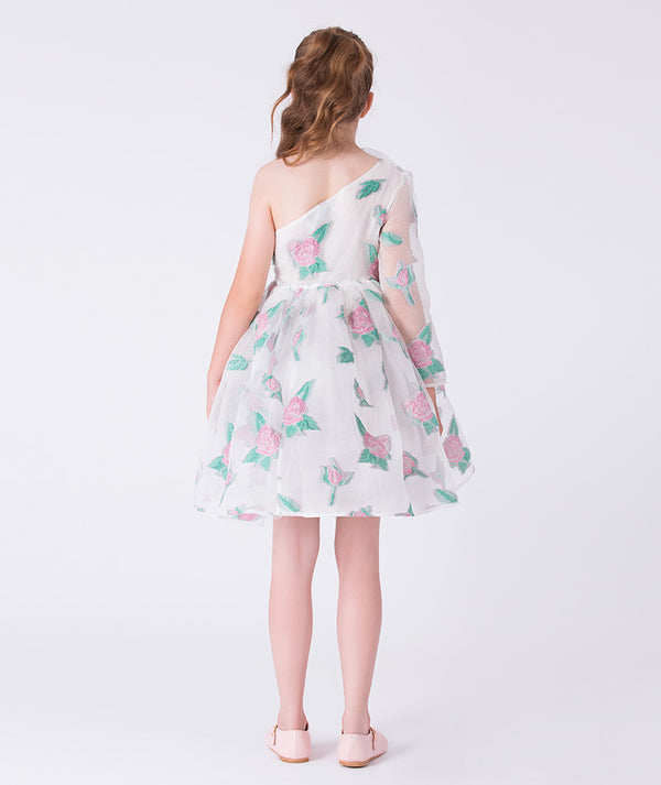 8 years old girl wearing a floral one-shoulder dress on a white background