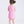 Load image into Gallery viewer, Child wearing a pink dress with white sneakers on a light gray background
