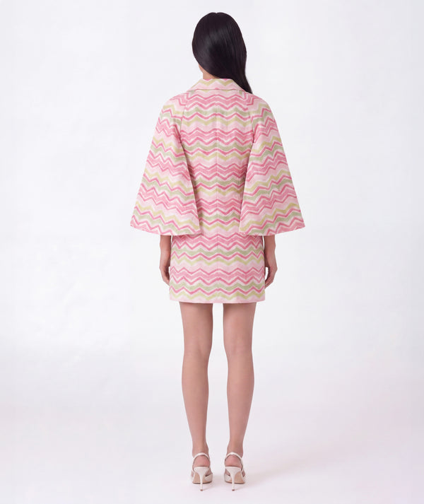 Back view of pink chevron girls cape and skirt set