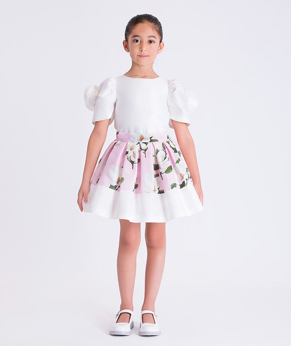 Girls ivory and floral matching outfit by Mama Luma featuring a puff-sleeve top and full skirt, ideal for birthdays, weddings, and special occasions, available in sizes 3–12