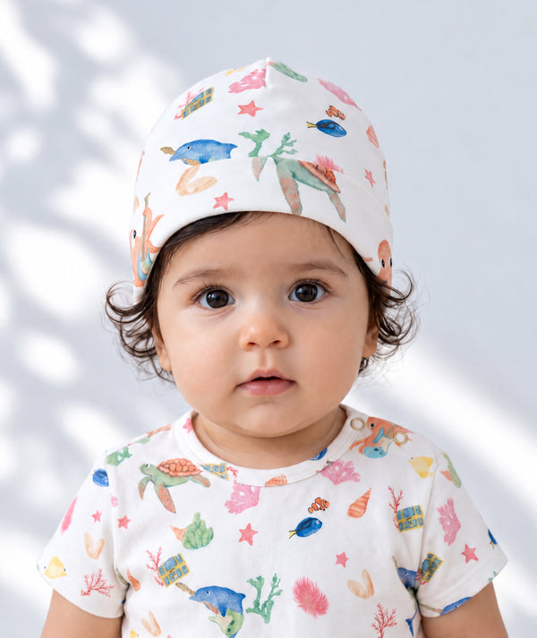 Baby beanie in a product photograph, soft everyday newborn accessory.