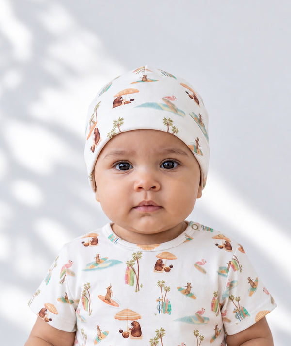 Beach-print baby beanie, soft baby headwear accessory.