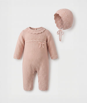 Blush diamond knit baby romper with matching bonnet luxury heirloom baby outfit perfect for special occasions