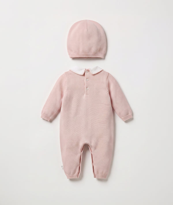 Blush bow knit baby romper with matching beanie luxury baby outfit with Peter Pan collar perfect for special occasions