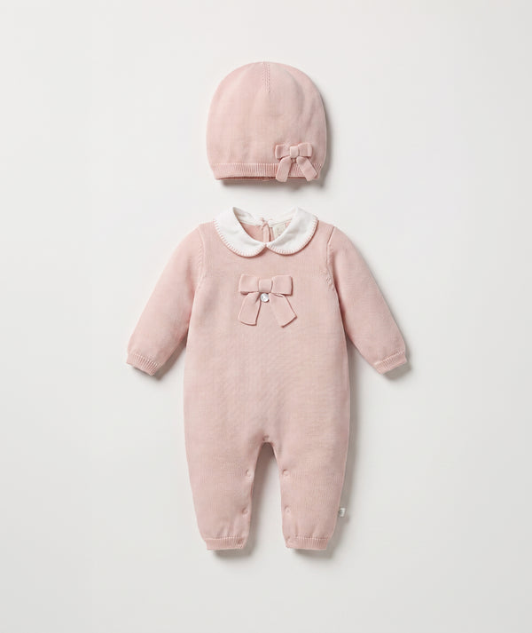 Blush bow knit baby romper with matching beanie luxury baby outfit with Peter Pan collar perfect for special occasions