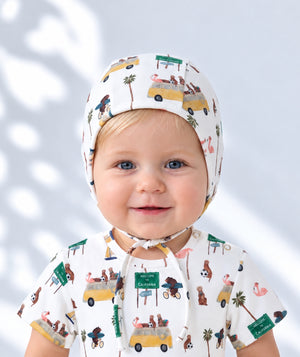 Baby bonnet photographed as a soft newborn accessory, alternate view.
