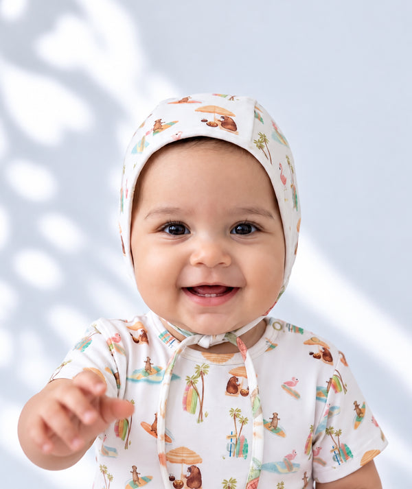 Cozy baby bonnet for newborn outfits, soft knit baby accessory.
