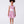Load image into Gallery viewer, Editorial view of Bougainvillea Bloom Blouse in white, featuring fabric texture and color
