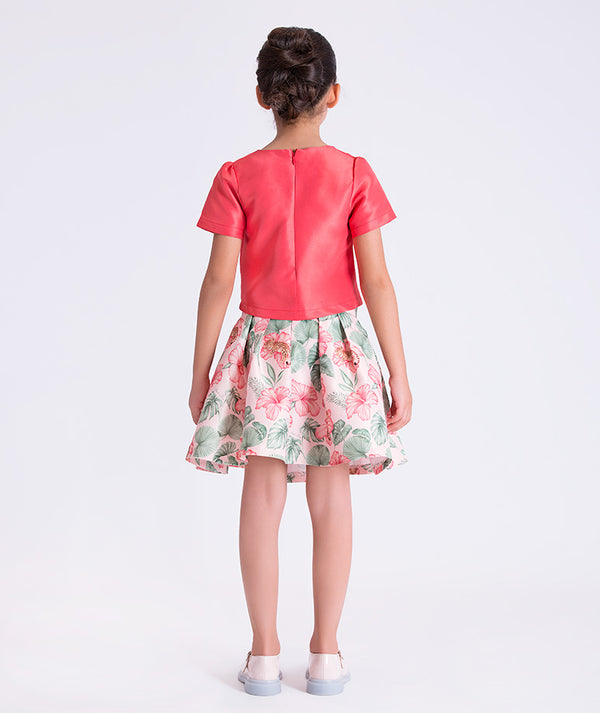 Back view of the Bow Enchanted Girls Outfit showing the tailored top and softly flared floral skirt made from breathable lightweight fabric, designed for girls ages 3–12 for Eid, Easter, and garden parties.