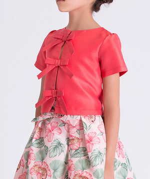 Close-up detail of the Bow Enchanted Girls Outfit highlighting the decorative bow accents and premium lightweight woven fabric of the top, fully cotton lined for comfort, ideal for festive events and celebrations for ages 3–12.