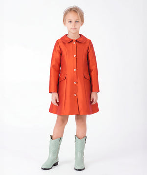 Front view of Button-Front Girls Twill Dress in coral for girls ages 3 to 12, a premium children’s design by Mama Luma