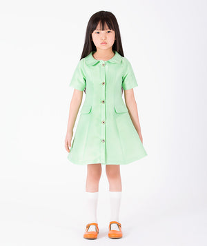 Front view of Button-Front Girls Twill Dress in mint green for girls ages 3 to 12, a premium children’s design by Mama Luma