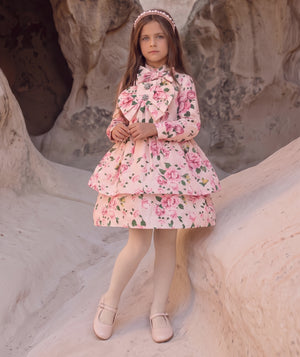 Front view of Candy Bow Girls Dress in green for girls ages 3 to 12, a premium children’s design by Mama Luma