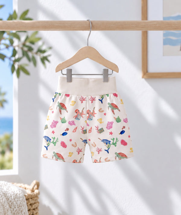 Ocean-print baby shorts for casual warm-weather baby outfits by Casa Marisol.