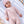 Carica l'immagine nel visualizzatore Galleria, Baby wearing a pink knit outfit, soft baby clothing editorial.
