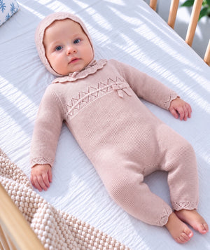 Pink knitted baby outfit set for cozy everyday baby clothing.