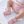 Charger l'image dans la galerie, Pink knitted baby booties, soft newborn footwear accessory.
