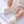Charger l'image dans la galerie, White puff baby booties, soft footwear for newborn outfits.
