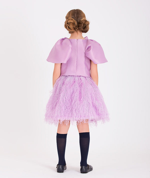 chic lilac blouse and feathered skirt