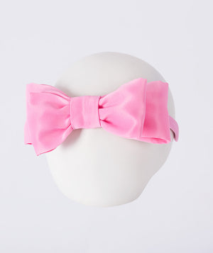 Classic Bow Headband in soft pink featuring a structured bow design by Mama Luma, perfectly paired with the 3D Flower Applique Girls Dress