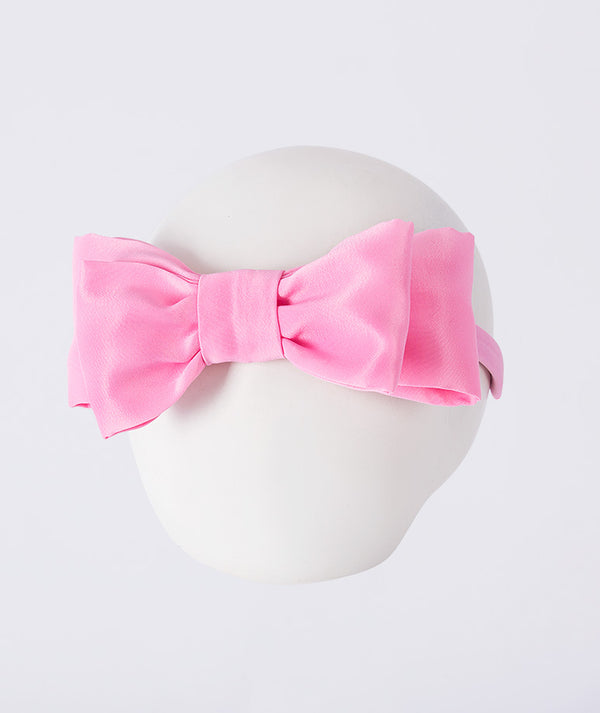 Classic Bow Headband in soft pink featuring a structured bow design by Mama Luma, perfectly paired with the 3D Flower Applique Girls Dress