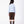 Load image into Gallery viewer, Back view of Classic Plaid Girls Bow Outfit with powder-blue collared top and chocolate tailored shorts for girls ages 3 to 12 by Mama Luma.
