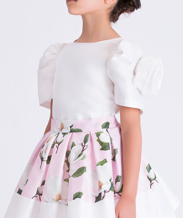 Close-up of Mama Luma girls outfit highlighting puff sleeves, floral skirt detail, and premium cotton fabric, perfect for celebrations and formal events, sizes 3–12