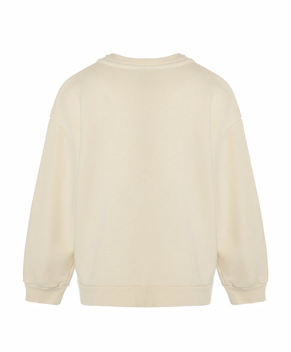 Back view of cream cotton athleisure outfit for girls ages 3 to 14