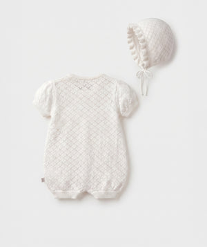 Ivory diamond knit baby bubble romper with matching bonnet luxury heirloom baby outfit perfect for special occasions