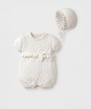 Ivory diamond knit baby bubble romper with matching bonnet luxury heirloom baby outfit perfect for special occasions