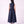 Charger l'image dans la galerie, Back view of the Crystal Collar Navy Women’s Dress from Mama Luma’s Suva Maia Collection, featuring a full satin skirt and concealed back zipper.
