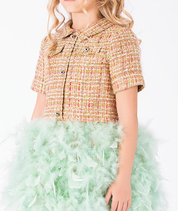 Close-up of Crystal Tweed Feathers Girls Dress in coral tweed for girls ages 3 to 12, highlighting fabric texture and designer details