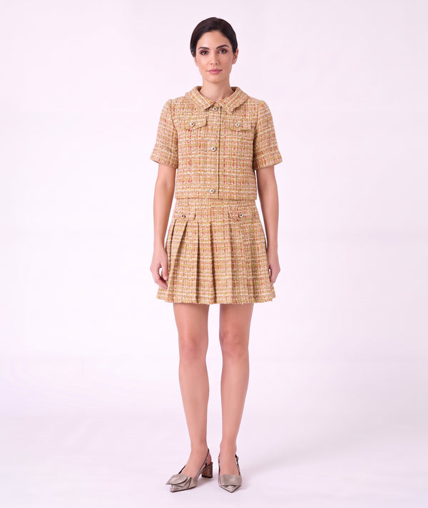 Front view of Mama Luma Crystal Tweed Women's Outfit featuring a short-sleeve tweed top and matching pleated skirt.