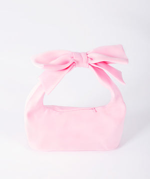 Front view of Cute Bow Bag in blush pink structured fabric, showing overall silhouette and styling