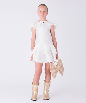 Front view of ivory girls dress with layered ruffle sleeves and tiered flounce skirt silhouette.
